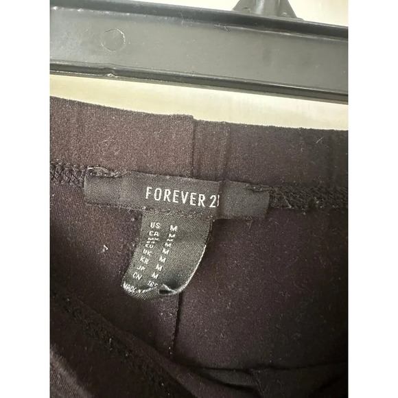 Forever21 women’s size medium black bell bottom leggings - Picture 5 of 7